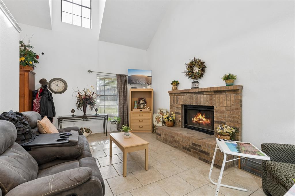 1317 Trinity View Street Irving, TX 75060 - Photo 13 of 31 a living room with furniture and a fireplace