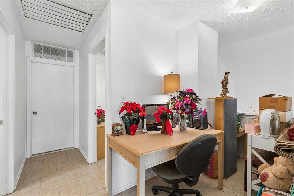 1317 Trinity View Street Irving, TX 75060 - Photo 20 of 31 a view of a workspace with furniture