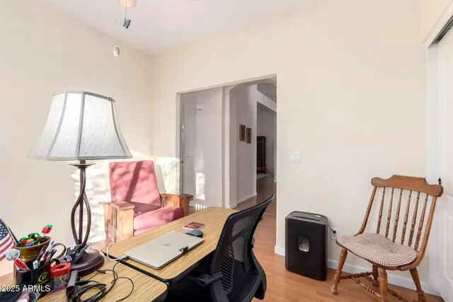 a view of a livingroom with furniture and a table