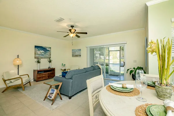 a living room with furniture and a table