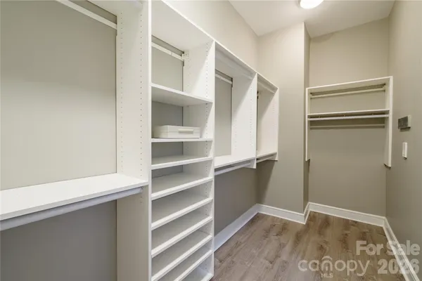 a view of an empty walk in closet