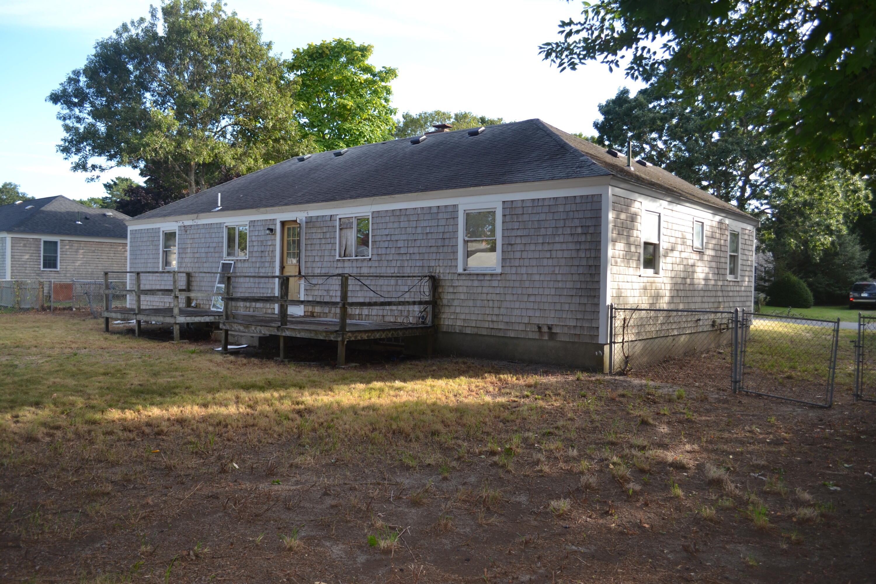 26-28 Hudson Road West Yarmouth, MA 02673 - Photo 2 of 10 a view of a house with a yard