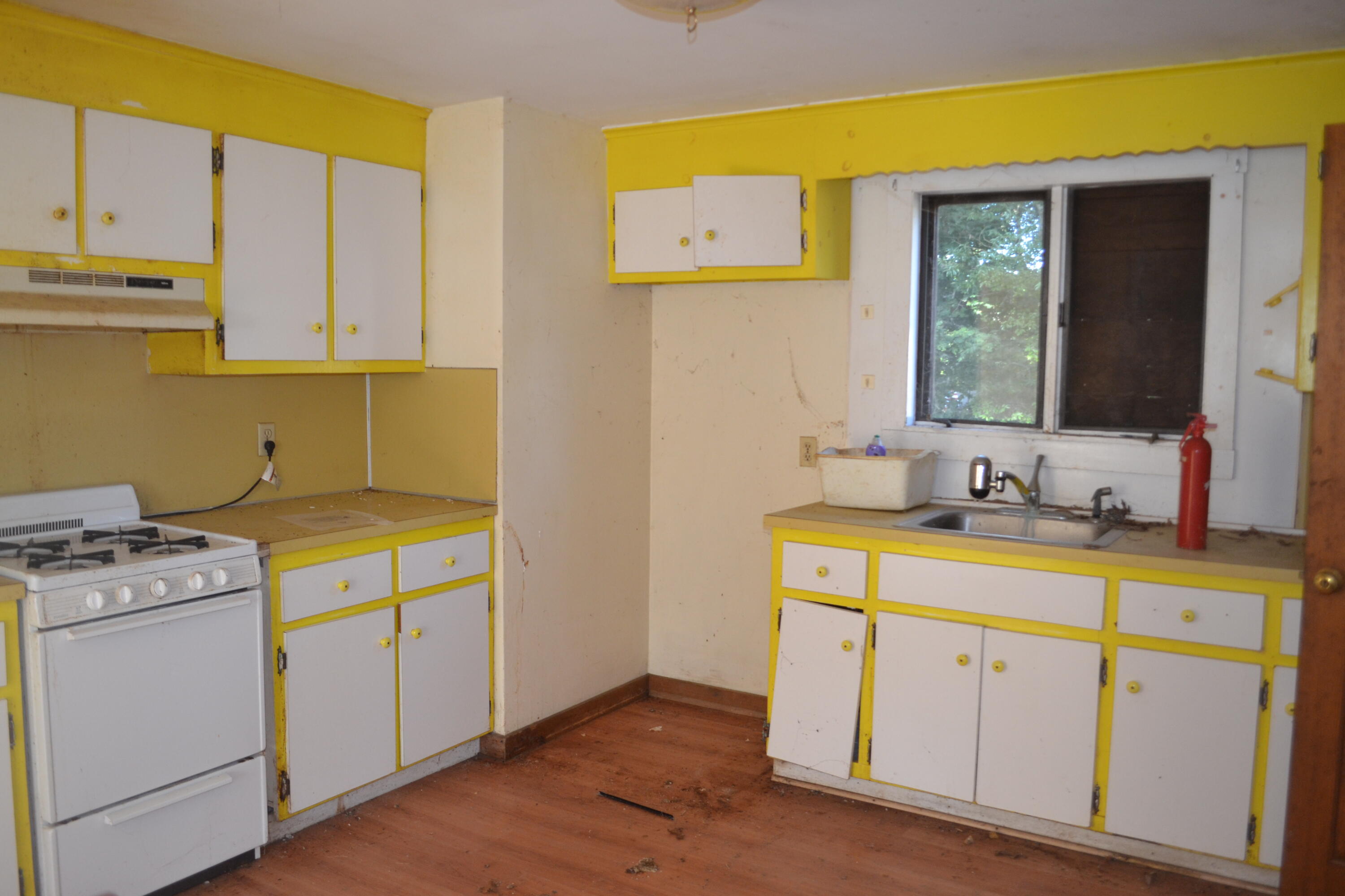 26-28 Hudson Road West Yarmouth, MA 02673 - Photo 3 of 10 a utility room with cabinets washer and dryer