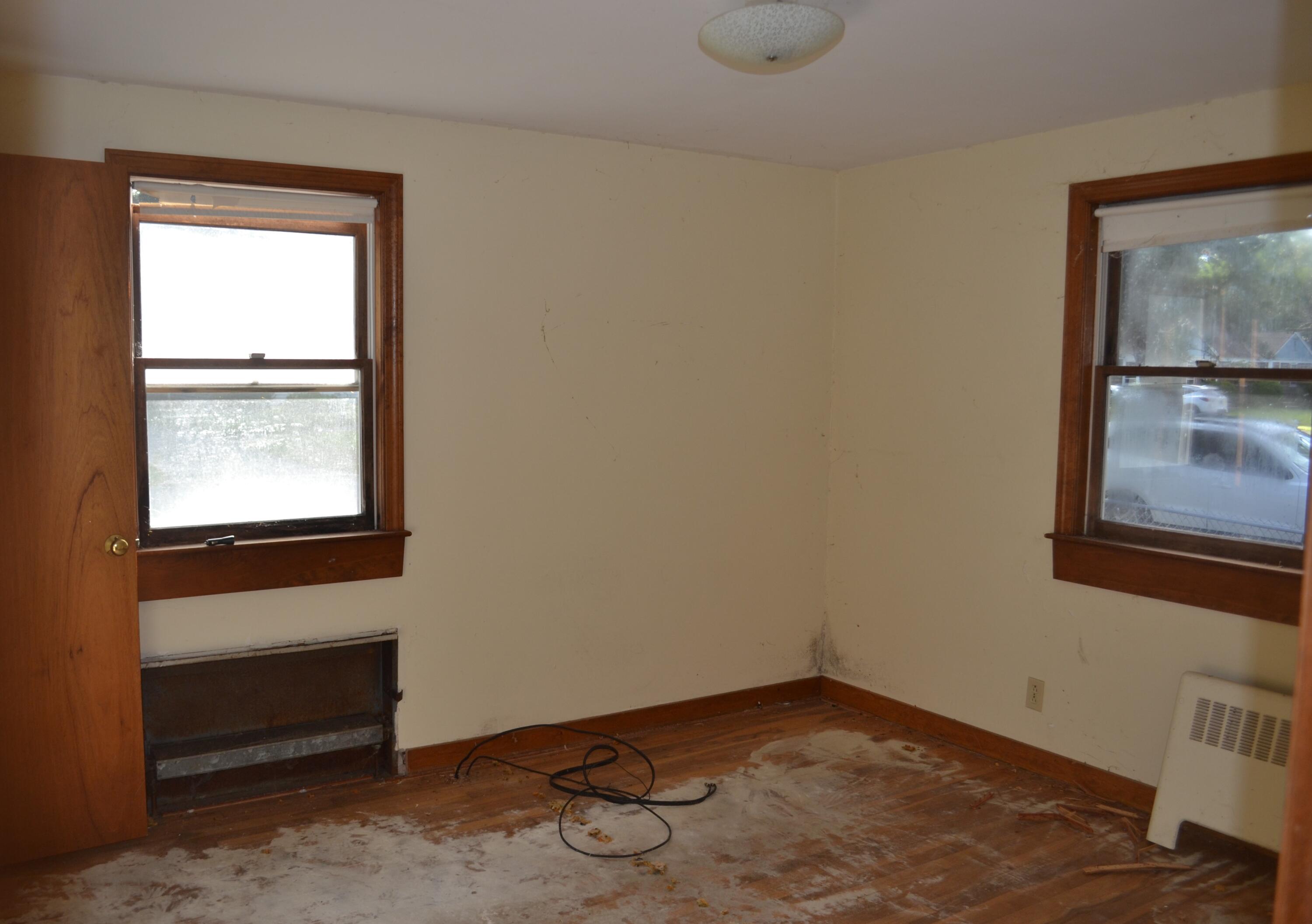 26-28 Hudson Road West Yarmouth, MA 02673 - Photo 4 of 10 a view of an empty room and window