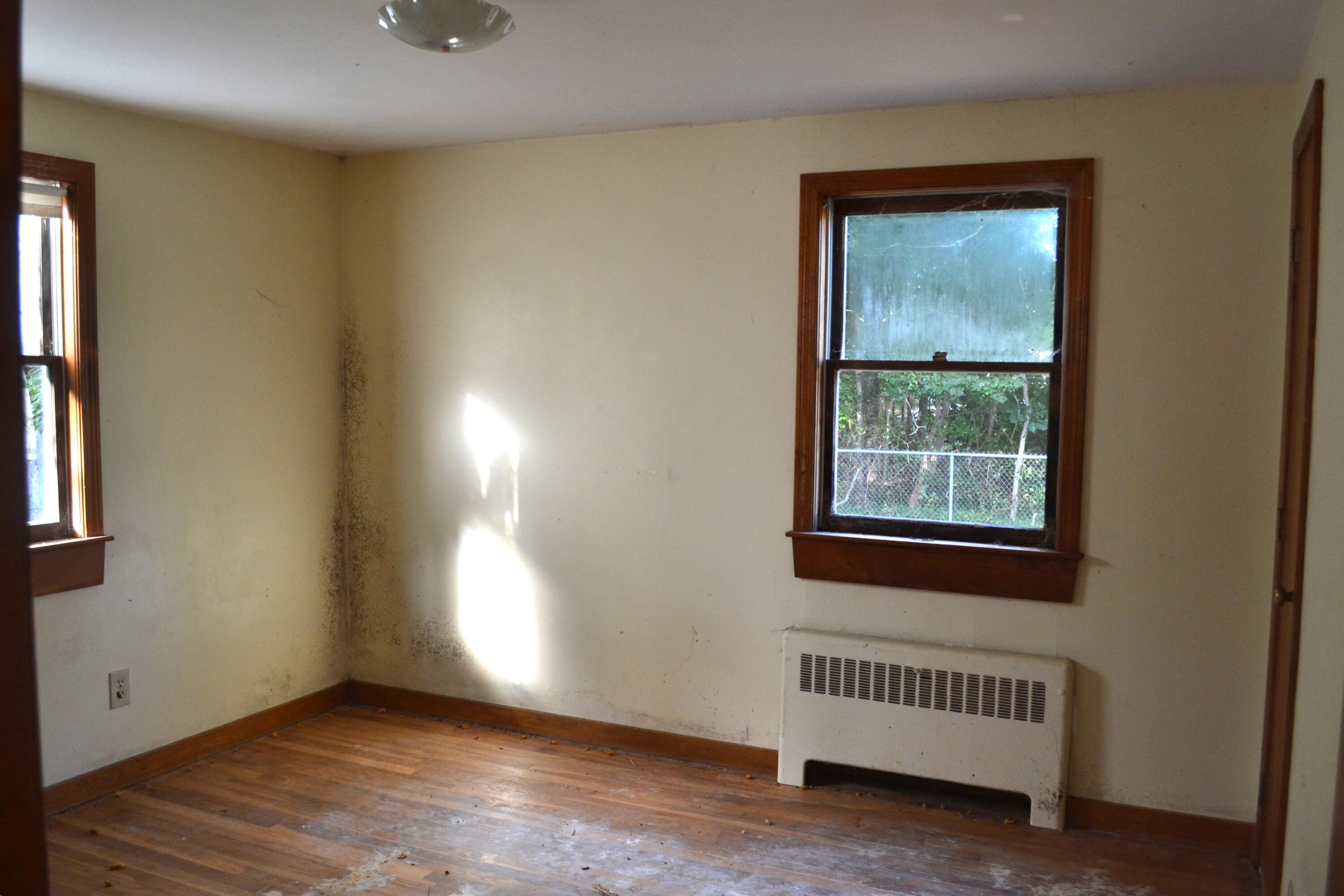 26-28 Hudson Road West Yarmouth, MA 02673 - Photo 6 of 10 an empty room with windows