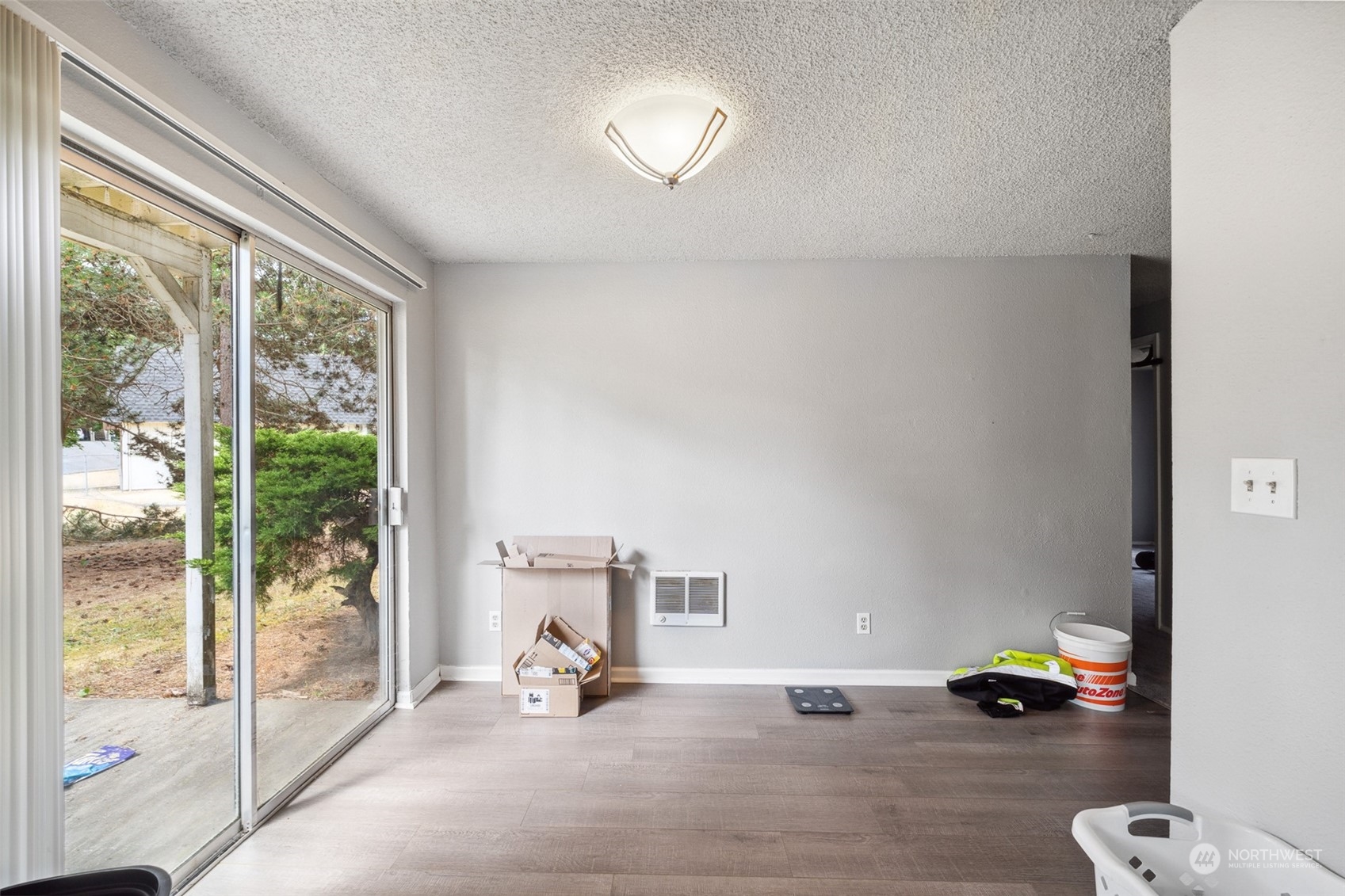 5012 South 58th Street Tacoma, WA 98409 - Photo 11 of 22 a view of livingroom with furniture and floor to ceiling window