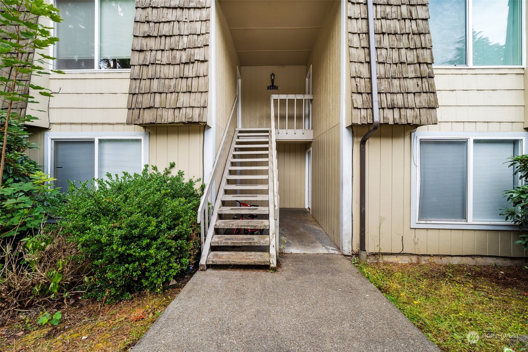 5012 South 58th Street Tacoma, WA 98409 - Photo 19 of 22 a view of a house with a yard