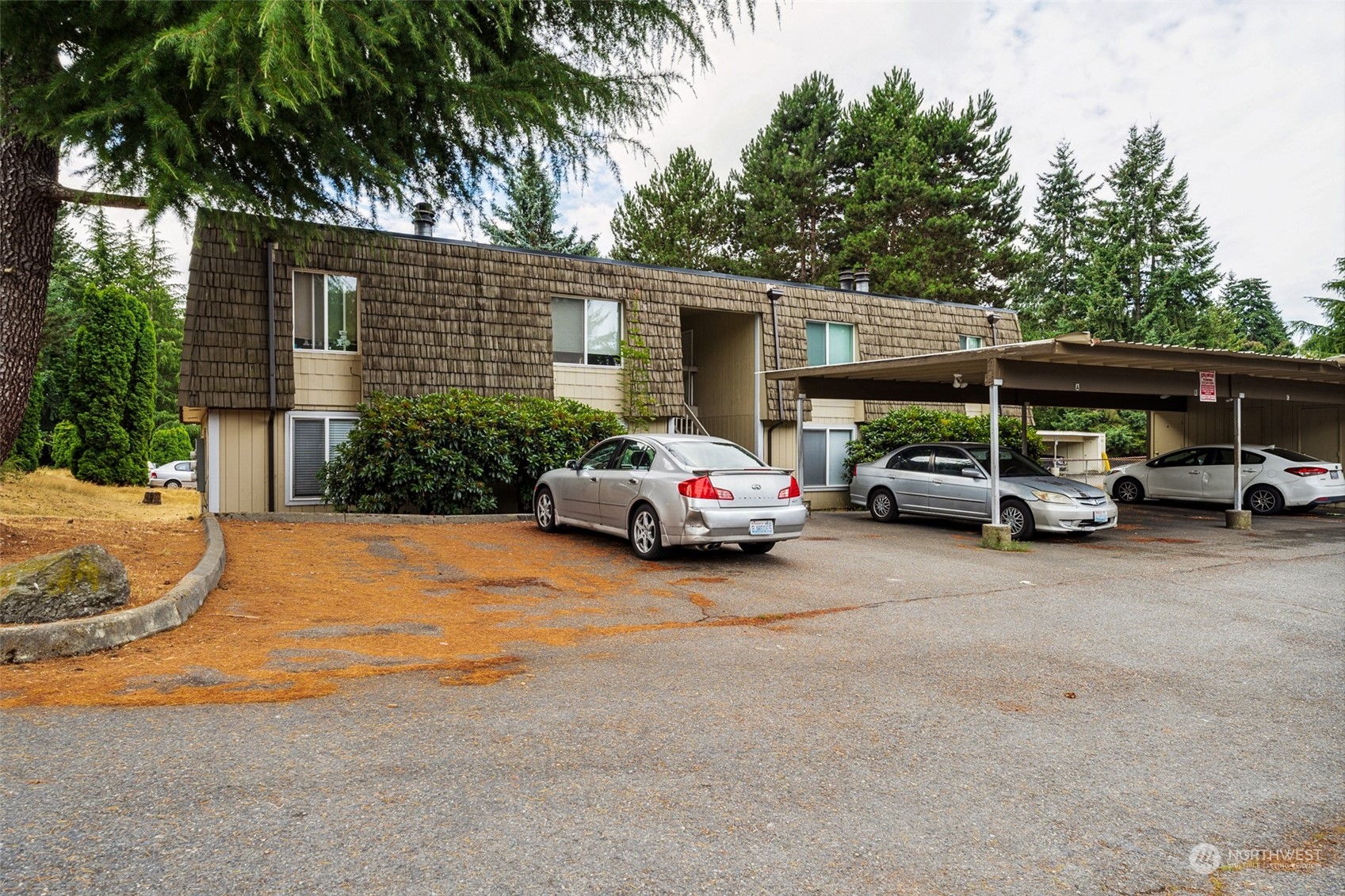 5012 South 58th Street Tacoma, WA 98409 - Photo 22 of 22 a car parked in front of a house