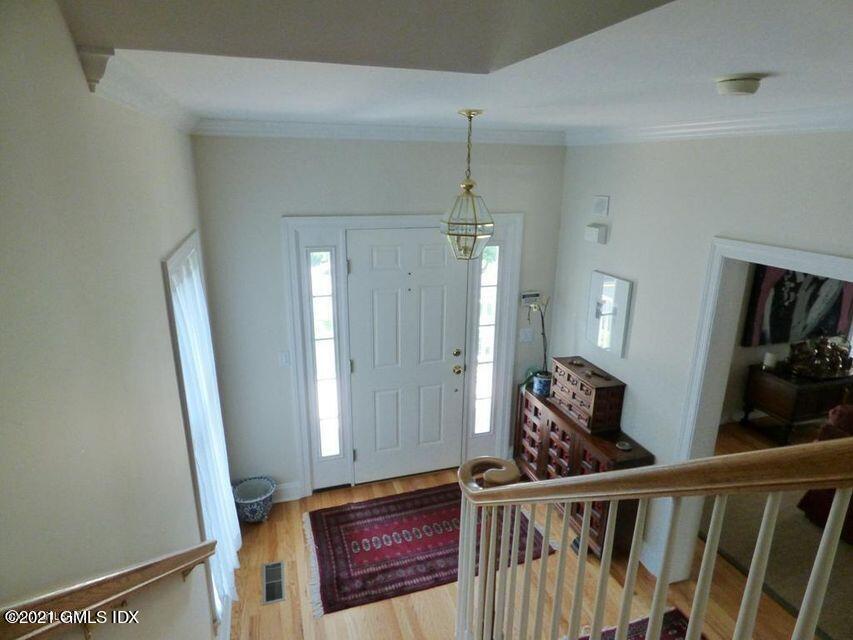 102 River Road Cos Cob, CT 06807 - Photo 4 of 14 a view of a hallway and a livingroom with furniture