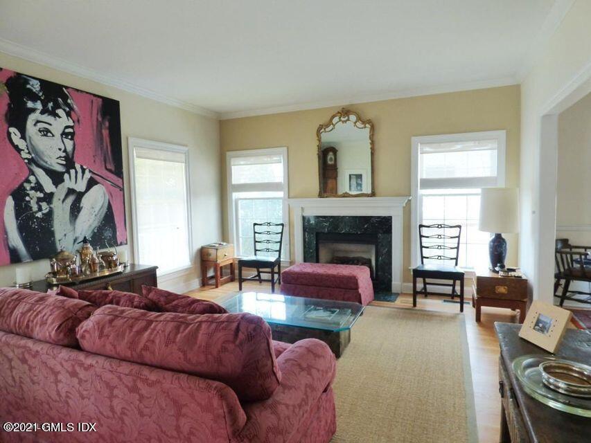 102 River Road Cos Cob, CT 06807 - Photo 5 of 14 a living room with furniture fireplace and window