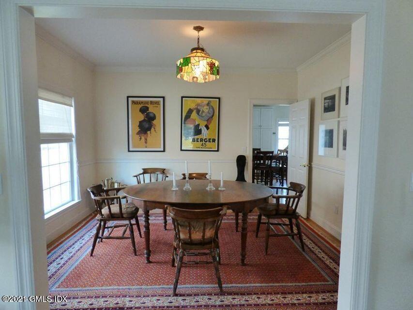 102 River Road Cos Cob, CT 06807 - Photo 7 of 14 a view of a dining room with furniture and window