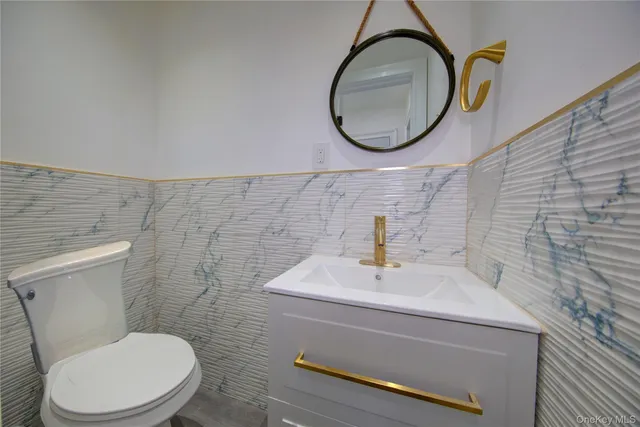 a bathroom with a toilet and a sink