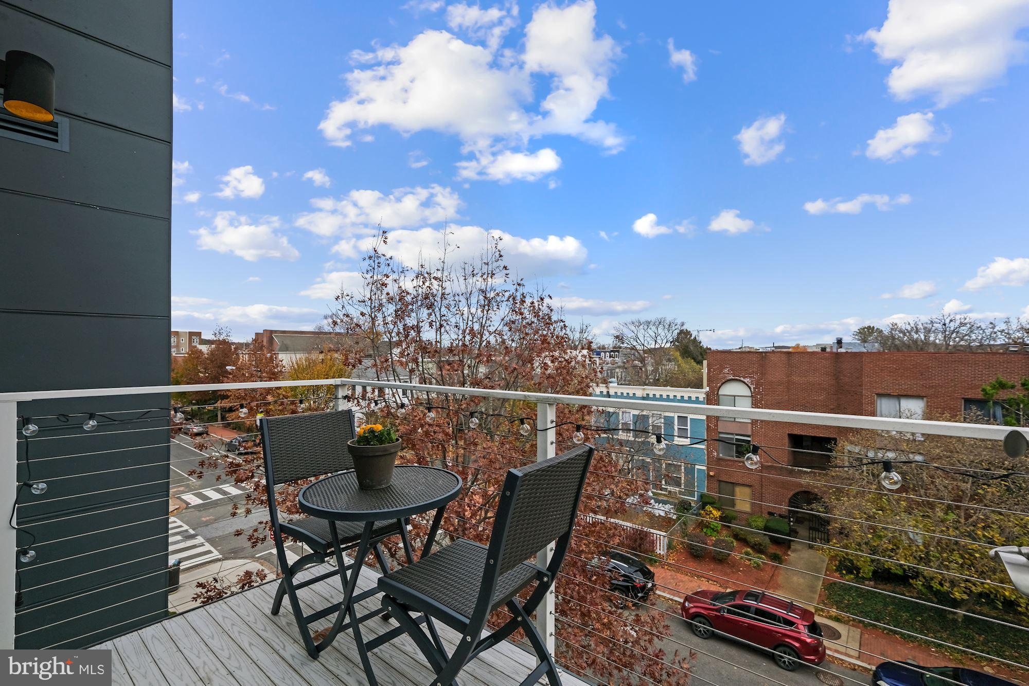 401 15th Street Southeast, Unit 403 Washington, DC 20003 - Photo 10 of 31 Table Space Living Balcony Off Kitchen/Dining Area