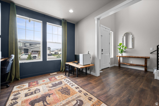 3359 Eurasian Crane Road Clinton, UT 84015 - Photo 16 of 71 Living area featuring dark wood-type flooring and recessed lighting
