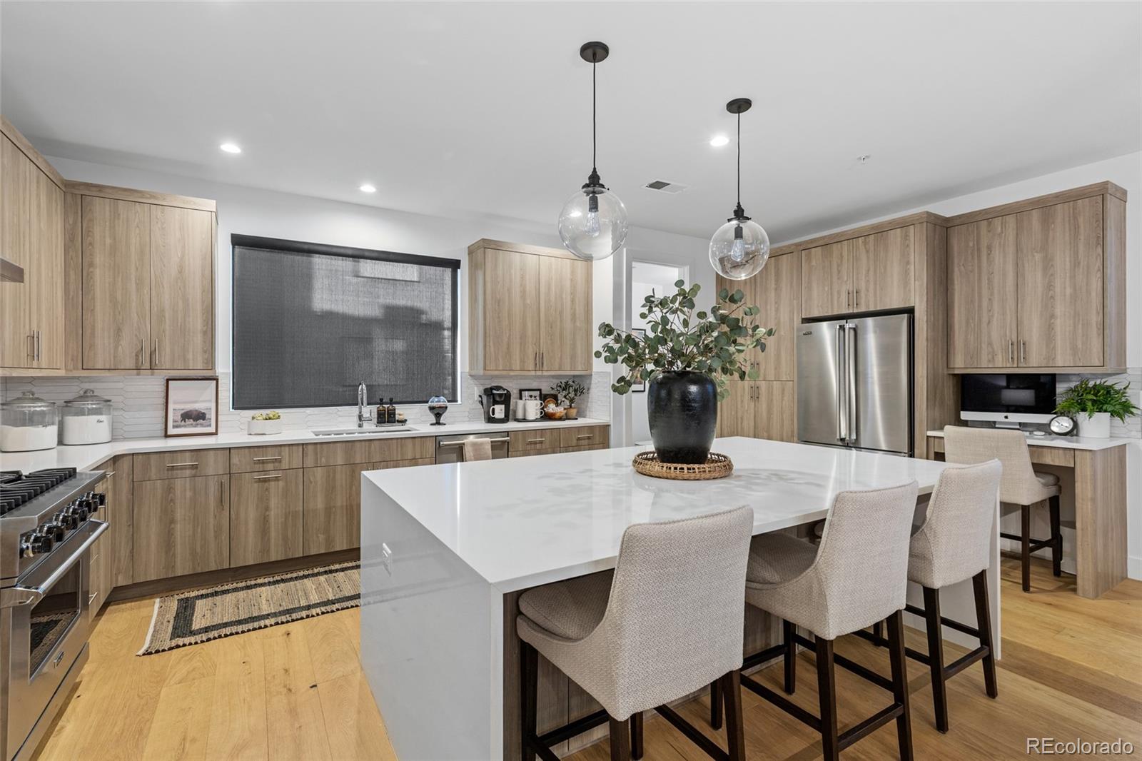 2475 Walnut Street Boulder, CO 80302 - Photo 15 of 50 a kitchen with a table and chairs in it
