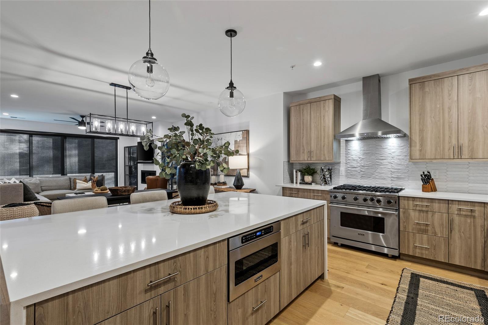 2475 Walnut Street Boulder, CO 80302 - Photo 16 of 50 a kitchen with a stove and a white cabinets