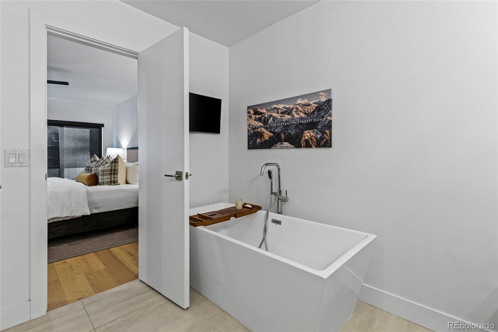 2475 Walnut Street Boulder, CO 80302 - Photo 31 of 50 a view of bedroom with furniture and window