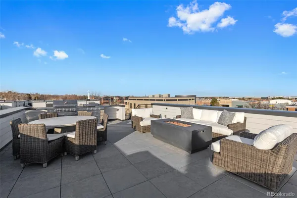 a view of roof deck with seating space