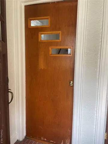 a bathroom with a granite countertop