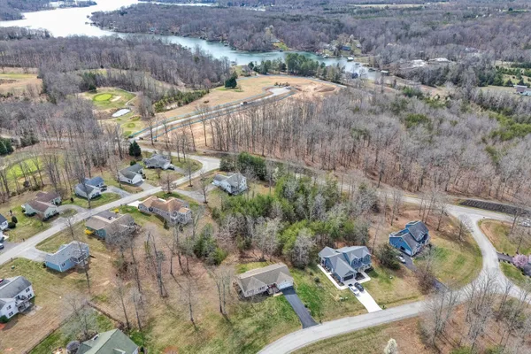 a view of multiple houses with outdoor space
