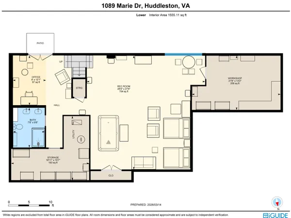 a view of a livingroom with workspace and a couch