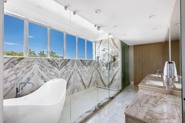a living room with furniture and a ceiling fan