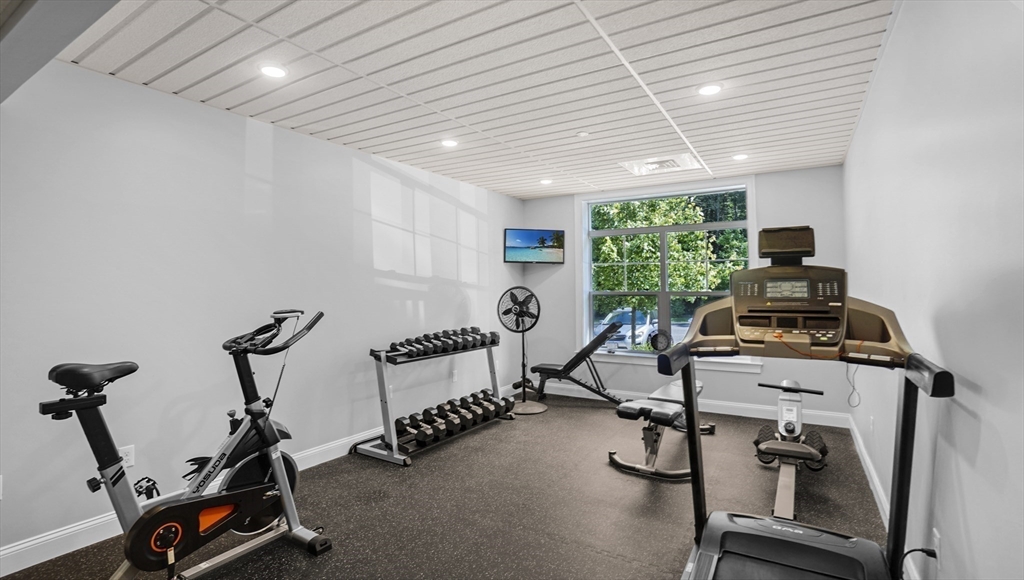 635 Old Post Road, Unit 204 Sharon, MA 02067 - Photo 19 of 22 a view of a room with gym equipment