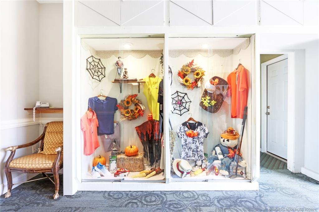5443 Southeast Miles Grant Road, Unit D205 Stuart, FL 34997 - Photo 35 of 44 Golf Shop Window