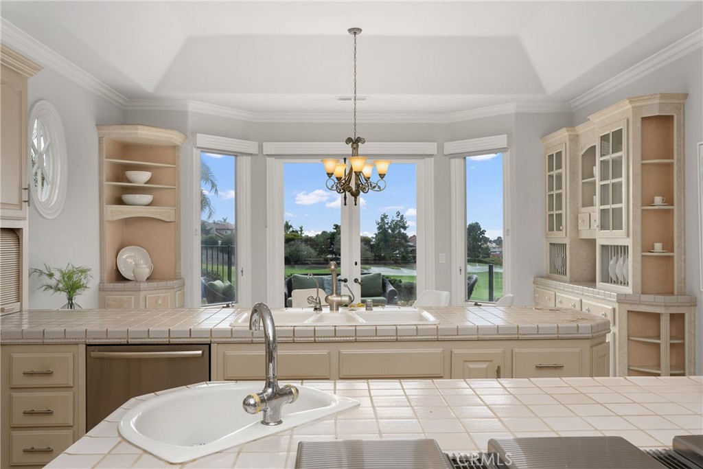 39 Marbella Dana Point, CA 92629 - Photo 17 of 58 a bathroom with a granite countertop sink and a large mirror
