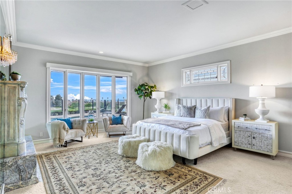 39 Marbella Dana Point, CA 92629 - Photo 24 of 58 a bedroom with a bed and large window