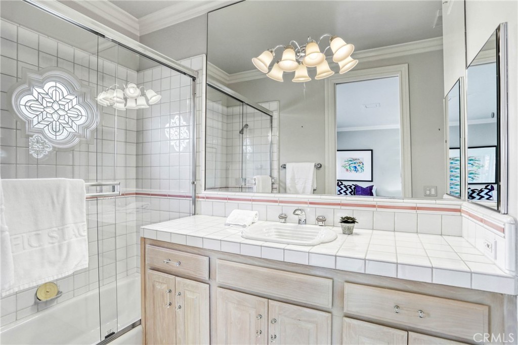 39 Marbella Dana Point, CA 92629 - Photo 31 of 58 a bathroom with a sink and a mirror