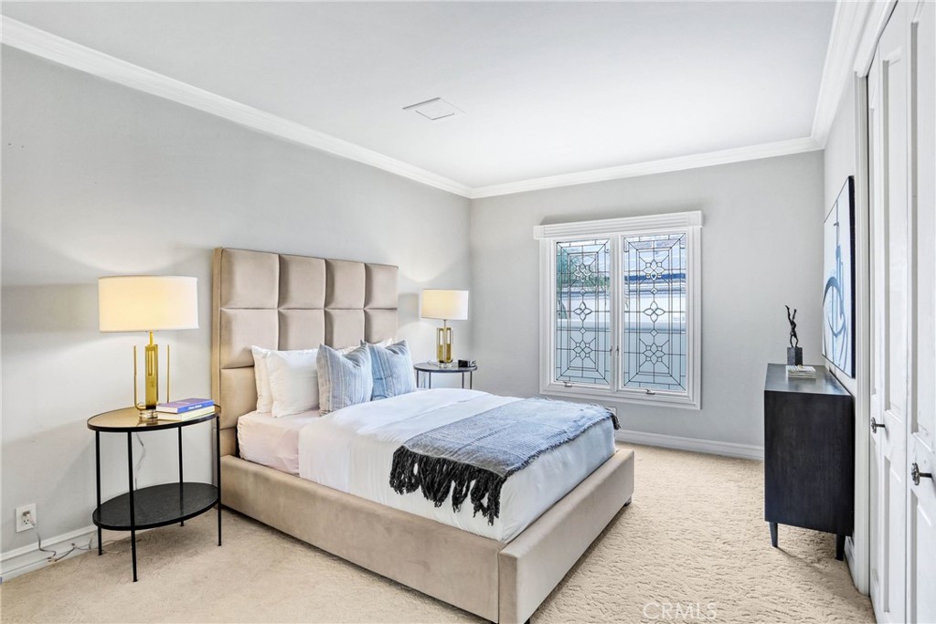 39 Marbella Dana Point, CA 92629 - Photo 32 of 58 a living room with a bed furniture and a window