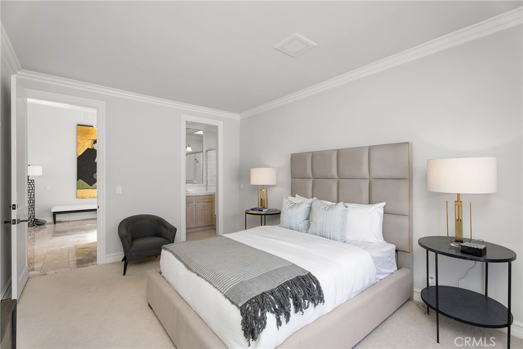 39 Marbella Dana Point, CA 92629 - Photo 33 of 58 a bedroom with a bed and a lamp