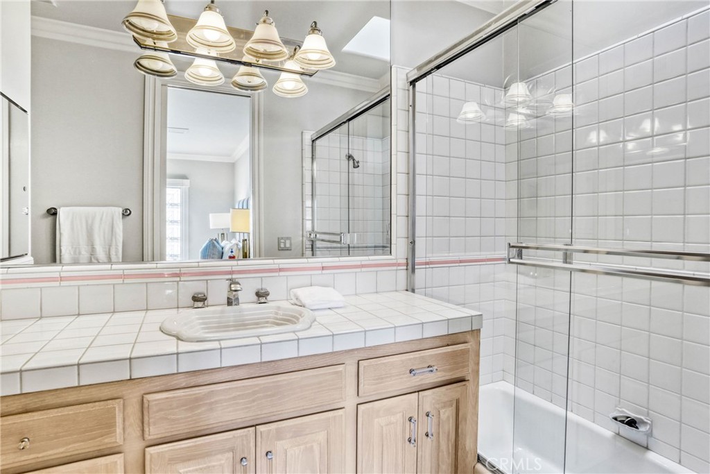 39 Marbella Dana Point, CA 92629 - Photo 34 of 58 a bathroom with a sink vanity granite and shower