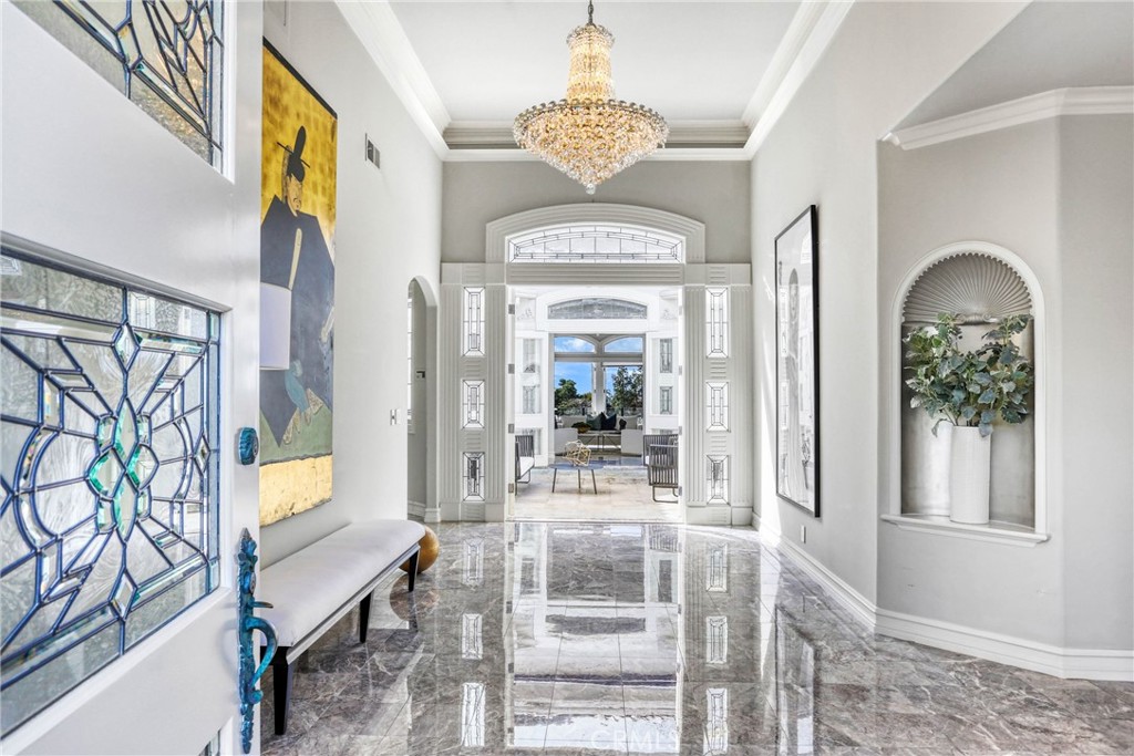 39 Marbella Dana Point, CA 92629 - Photo 4 of 58 a view of a hallway with furniture and a window