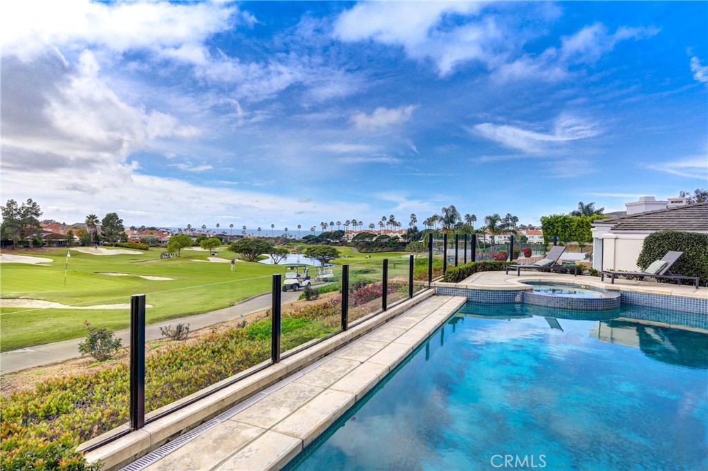 39 Marbella Dana Point, CA 92629 - Photo 41 of 58 a view of swimming pool from a balcony with outdoor seating