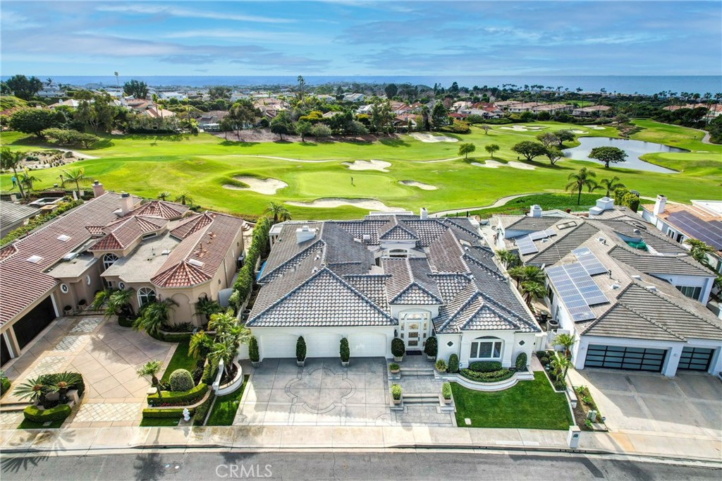 39 Marbella Dana Point, CA 92629 - Photo 48 of 58 an aerial view of a house with garden space and ocean view