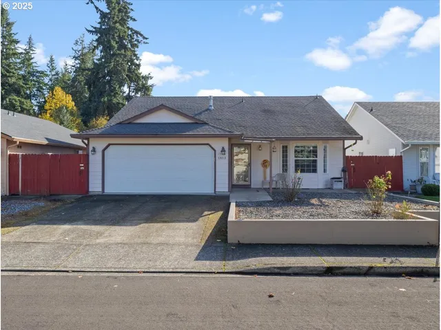 a front view of a house with yard