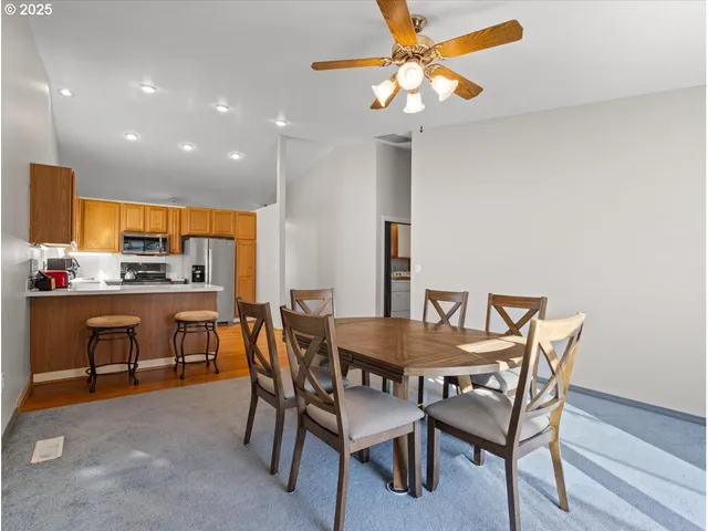 a view of a dining room with furniture