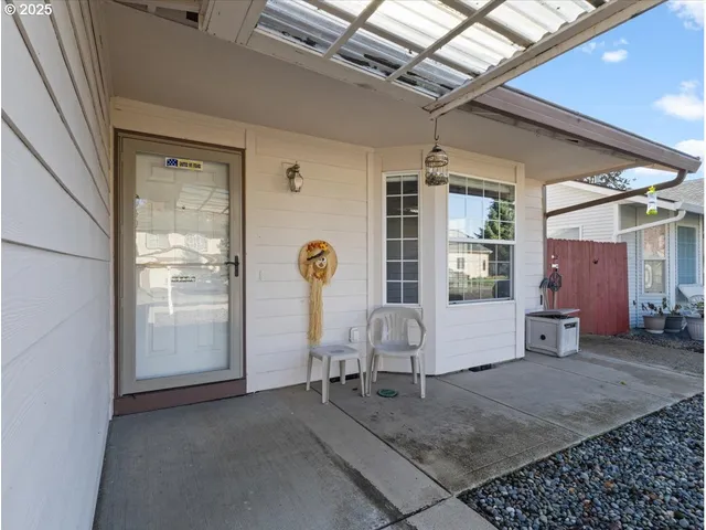 a view of a livingroom with furniture and window