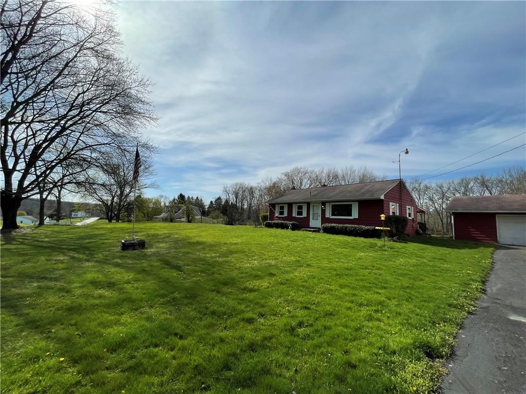 2711 Old Rte 18 Wampum, PA 16157 - Photo 19 of 23 a view of a big house with a big yard and a large tree