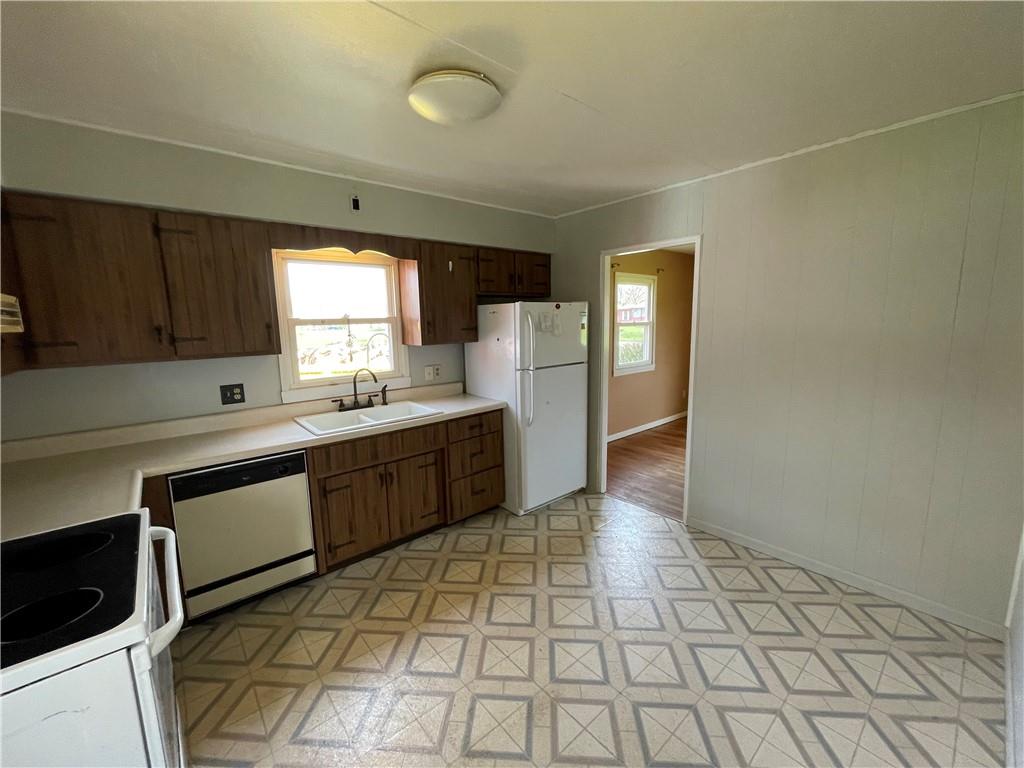 2711 Old Rte 18 Wampum, PA 16157 - Photo 3 of 23 a kitchen with stainless steel appliances a sink and cabinets