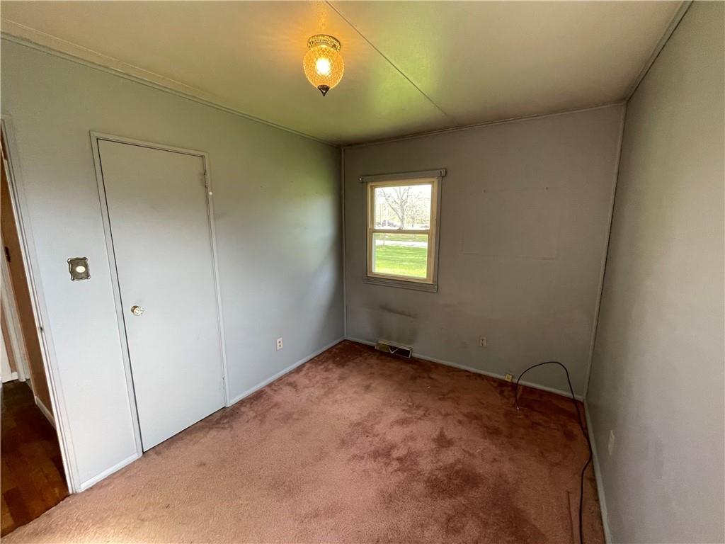 2711 Old Rte 18 Wampum, PA 16157 - Photo 9 of 23 a view of an empty room with a window