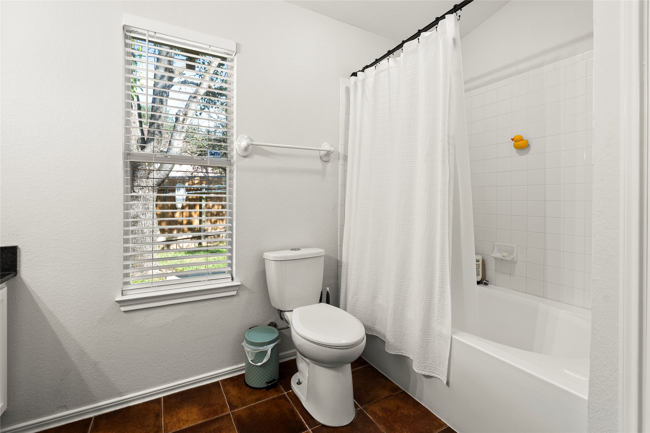 9024 Heiden Lane Austin, TX 78749 - Photo 21 of 33 A shower and tub combination provides options for a quick morning rinse or a relaxing soak, keeping the layout highly practical