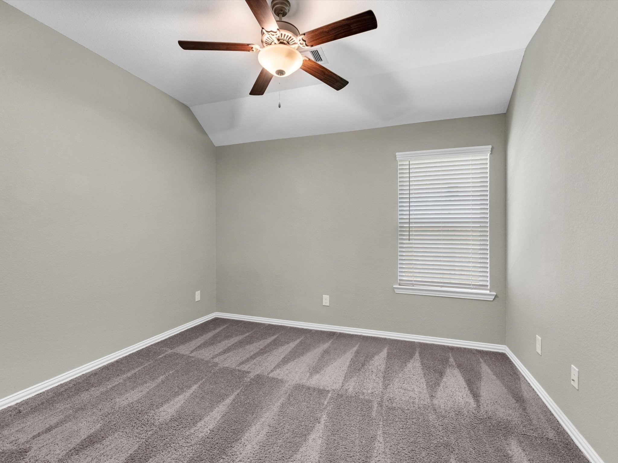 31120 Aspen Gate Trail Spring, TX 77386 - Photo 21 of 33 an empty room with chandelier fan and windows