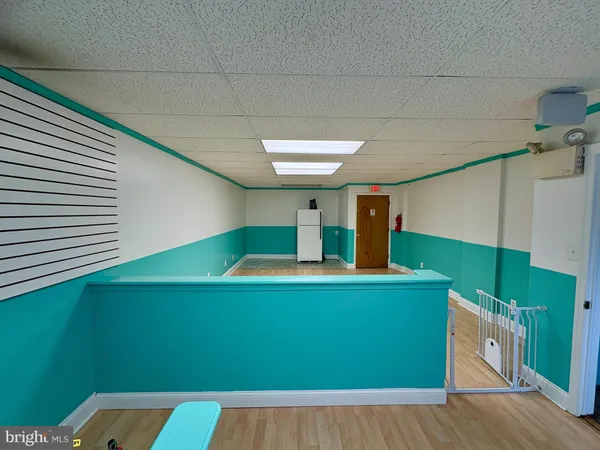 a kitchen with lots of green space and cabinets