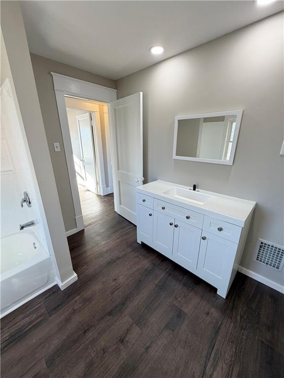 320 Reis Street New Castle, PA 16101 - Photo 17 of 28 a view of a hallway with wooden floor
