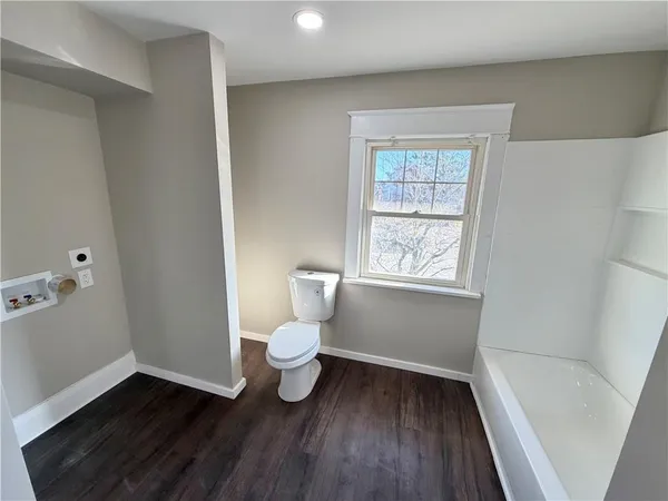 a bathroom with a sink and a toilet