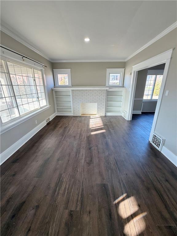 320 Reis Street New Castle, PA 16101 - Photo 5 of 28 an empty room with wooden floor and windows