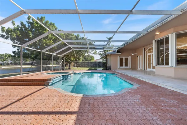a view of a house with a swimming pool
